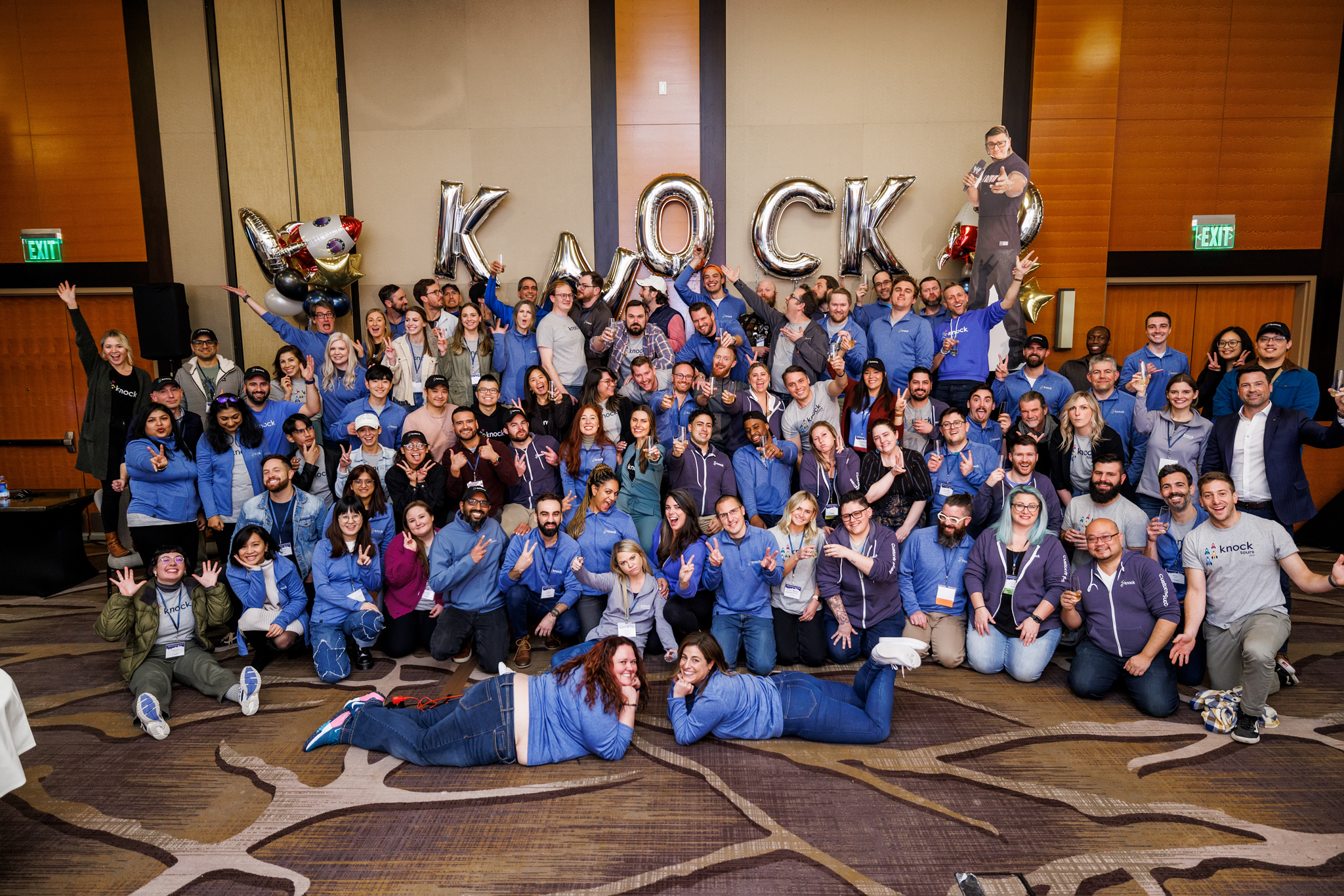 The Knock team poses together in the office.