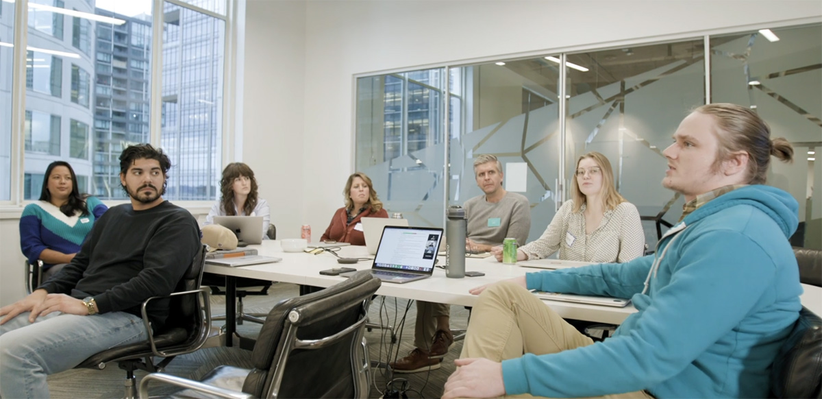 Shelf Engine team members having a meeting in the office