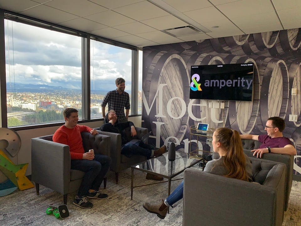 amperity seattle tech office gathering in meeting room