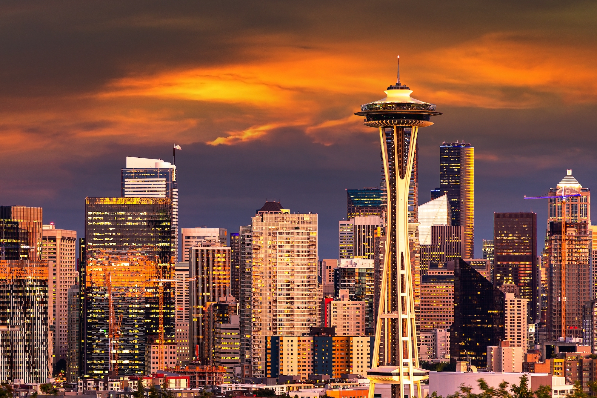A photo of the Seattle skyline is shown.