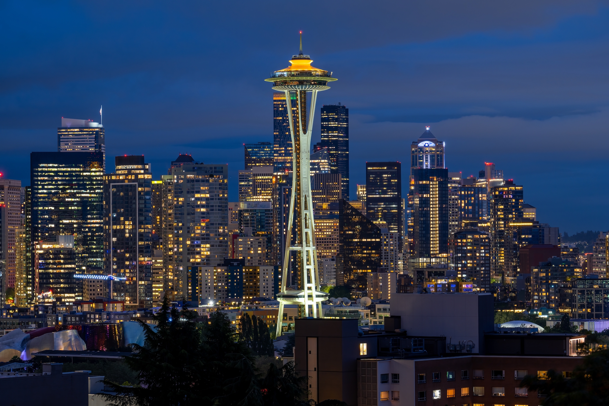 A nighttime photo of the Seattle skyline.