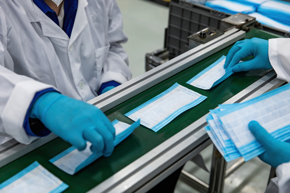 Surgical masks being manufactured