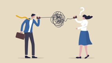 A man speaks through a can attached to a wire to a woman. The wire in between them is extremely tangled and knotted, causing the message to come through garbled in a way that confuses the woman.
