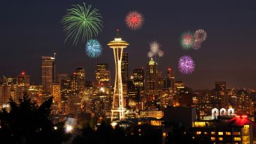 Downtown Seattle surrounded by fireworks.
