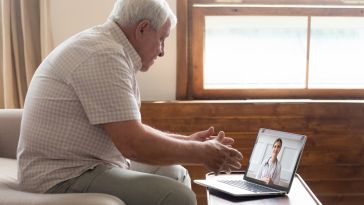 An older adult receives telehealth care