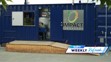 A blue shipping container converted into Impact Bioenergy’s food waste energy unit