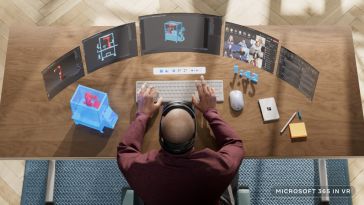 Someone sitting at a desk using Microsoft 365 in VR.