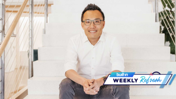 DoorDash CEO sits on a staircase in the office