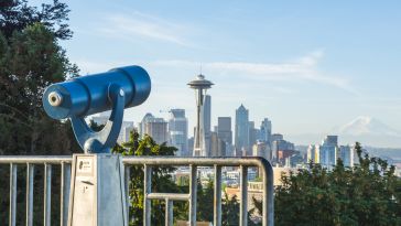 A telescope facing the Seattle skyline.