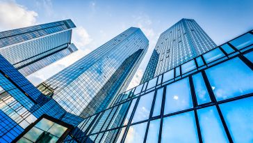 A ground-level shot of high-rise buildings