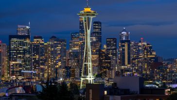 A nighttime photo of the Seattle skyline.