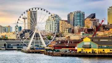 A photo of the Seattle skyline is shown.